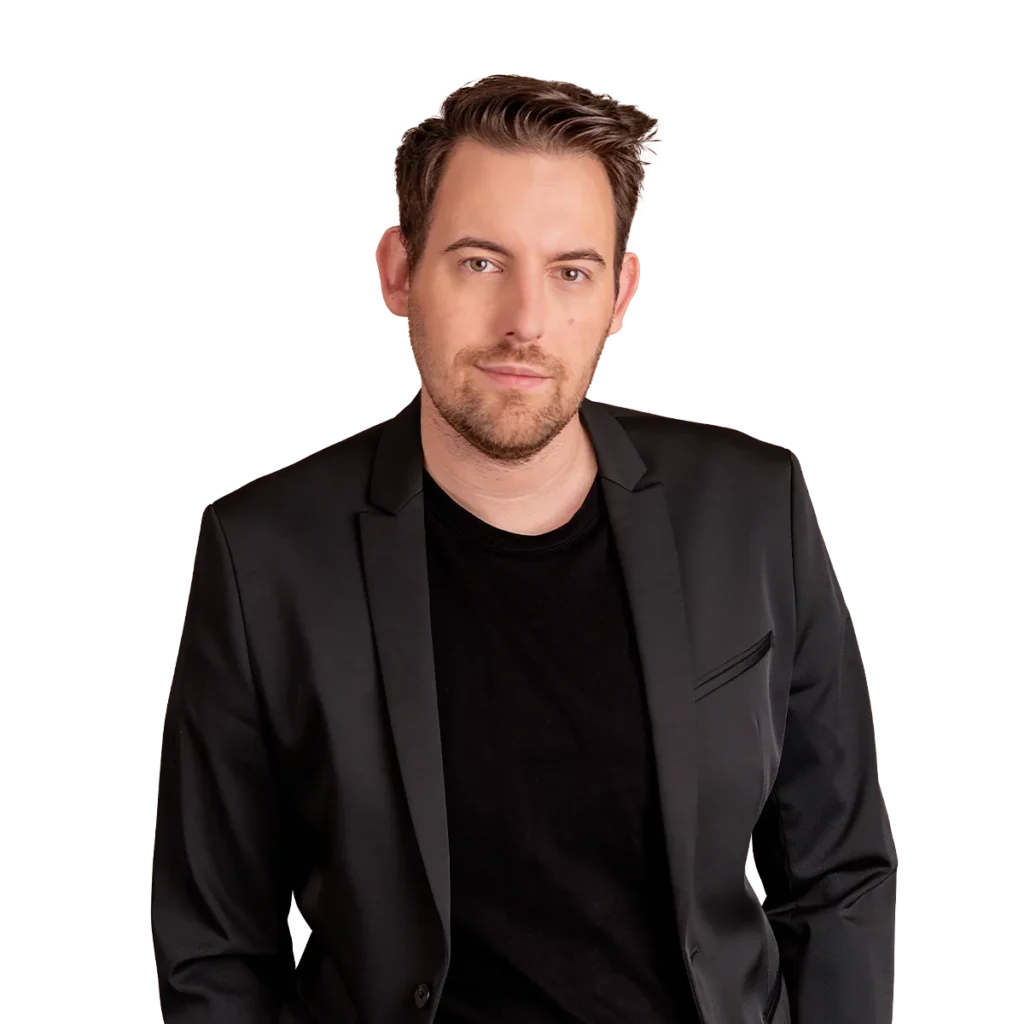 Bence Székely, digital marketing consultant and strategist, wearing a black suit and t-shirt